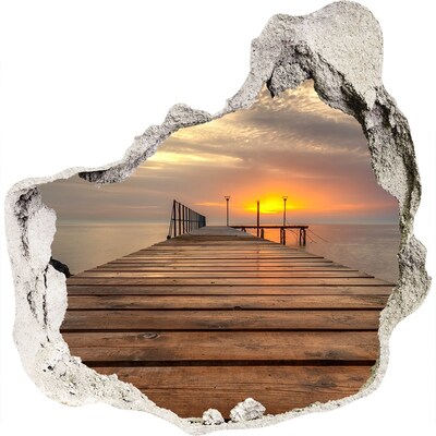 Zelfklevende muursticker 3D gat Zonsondergang boven de pier