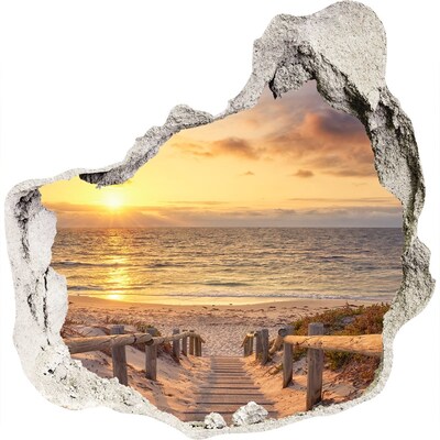 Zelfklevende muursticker 3D gat Zonsondergang boven het strand