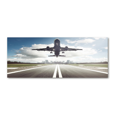 Schilderij op acrylglas Een vliegtuig dat opstijgt