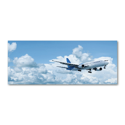 Plexiglas foto Een vliegtuig in de lucht