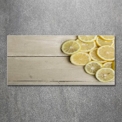 Foto obraz szkło akryl Cytryny drewno