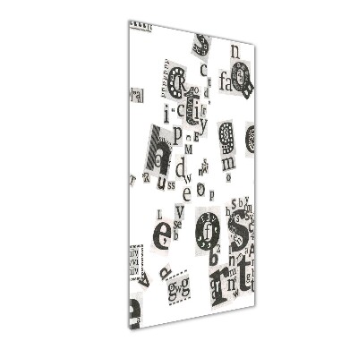 Foto obraz szkło akryl pionowy Litery z gazety