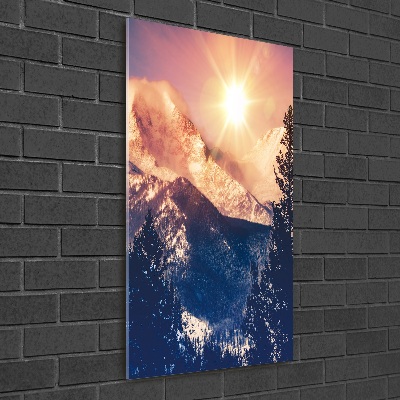 Foto obraz szkło akryl pionowy Słońce nad górami