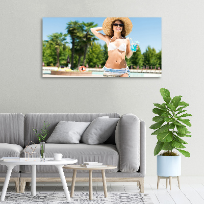 Foto obraz na płótnie Kobieta nad basenem