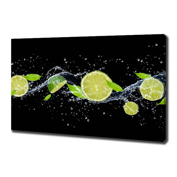 Canvas foto Limoenen en water