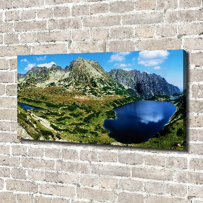 Foto op canvas Een vallei in de bergen