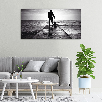 Canvas foto Gitarist op de pier