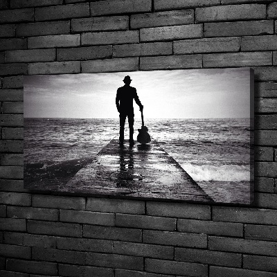 Canvas foto Gitarist op de pier