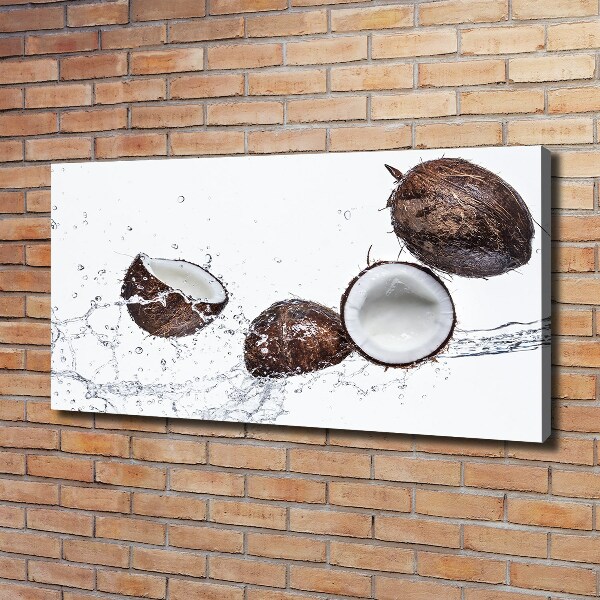 Canvas foto Kokosnoot met water