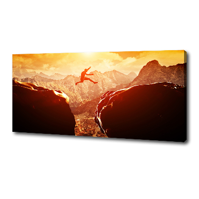 Canvas foto Spring over de afgrond