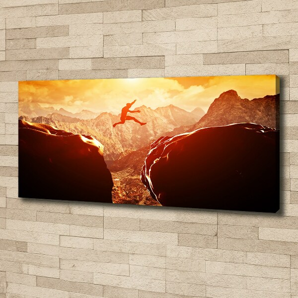 Canvas foto Spring over de afgrond