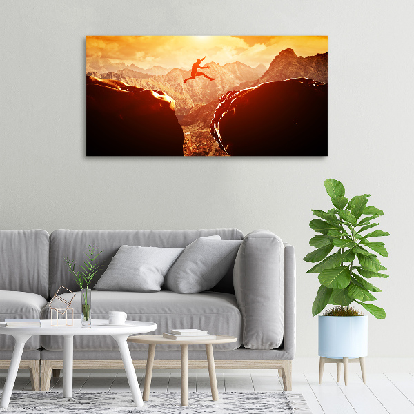 Canvas foto Spring over de afgrond