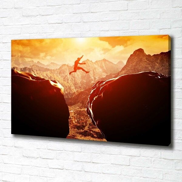 Canvas foto Spring over de afgrond