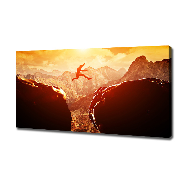 Canvas foto Spring over de afgrond