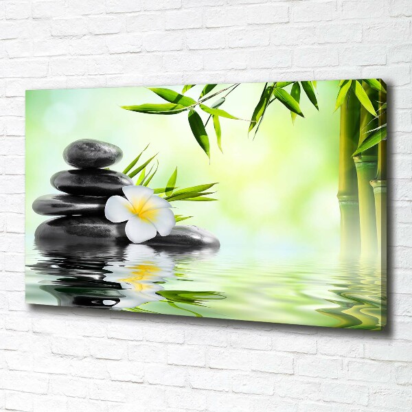 Canvas foto Plumeria en bamboe
