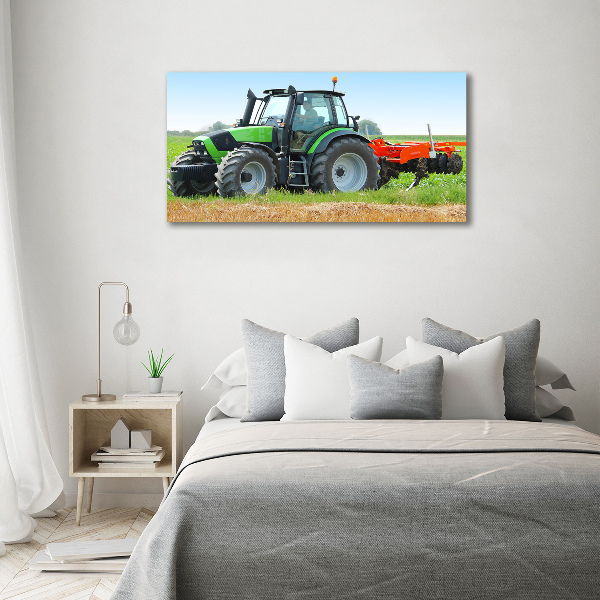 Canvas foto Tractor op het veld