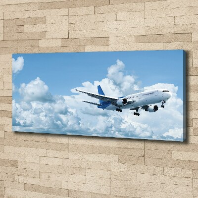 Canvas schilderij Een vliegtuig in de lucht