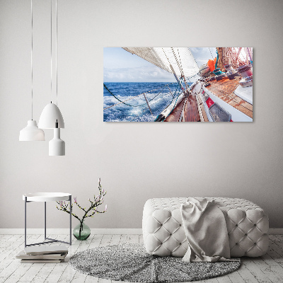 Canvas foto Een zeilboot op zee
