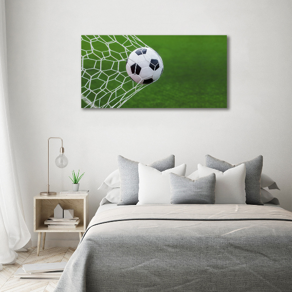 Schilderij op canvas De bal ligt in het doel.