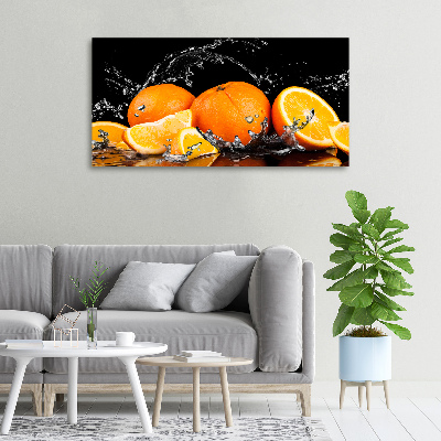 Foto canvas Sinaasappels en water