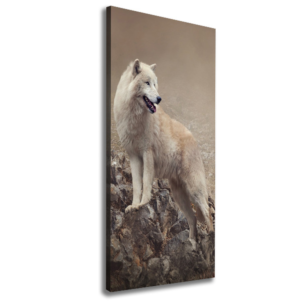 Verticaal schilderij op canvas Wolf op een rots