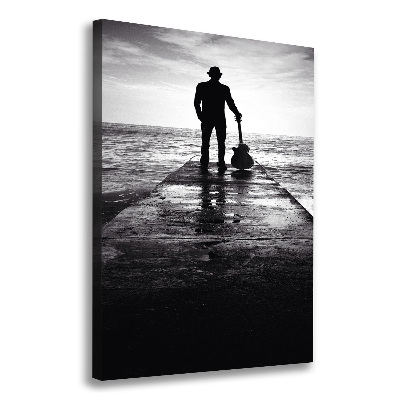 Verticaal schilderij op canvas Gitarist op de pier