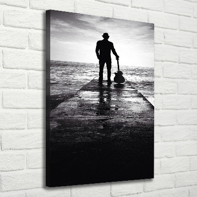 Verticaal schilderij op canvas Gitarist op de pier