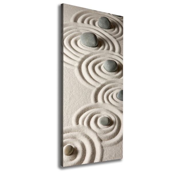 Verticaal canvasschilderij Stenen in het zand