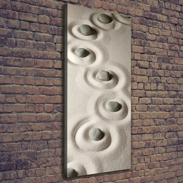 Verticaal canvasschilderij Stenen in het zand