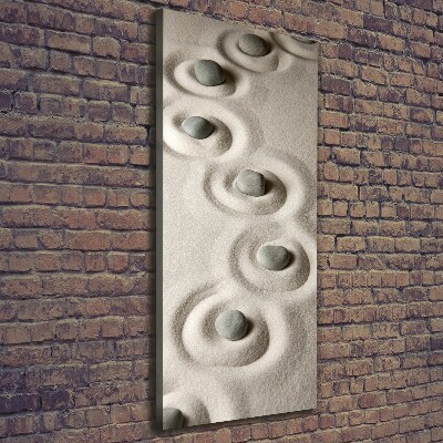 Verticaal canvasschilderij Stenen in het zand