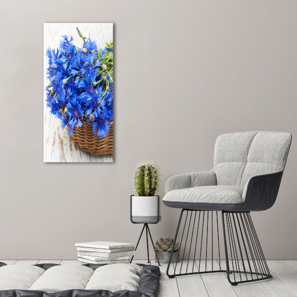 Verticale foto op canvas Korenbloemen in een mand