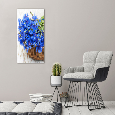 Verticale foto op canvas Korenbloemen in een mand