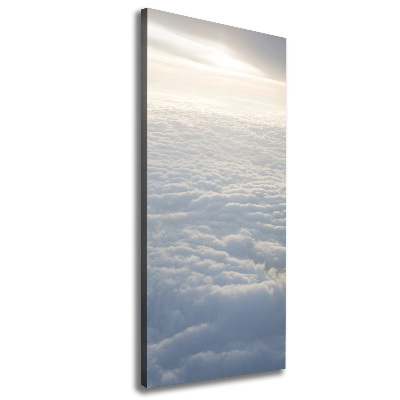 Verticaal schilderij op canvas Vliegen boven de wolken