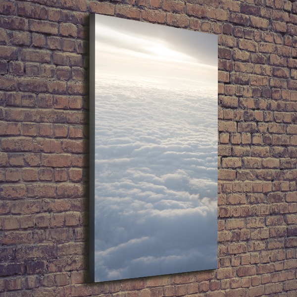 Verticaal schilderij op canvas Vliegen boven de wolken