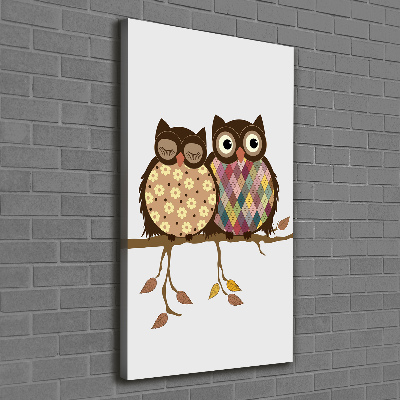 Verticaal canvasschilderij Een paar uilen op een tak