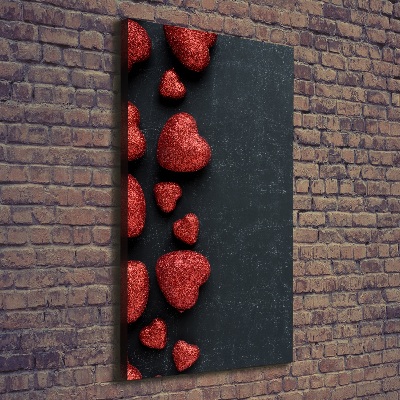 Verticaal schilderij op canvas Harten op het bord