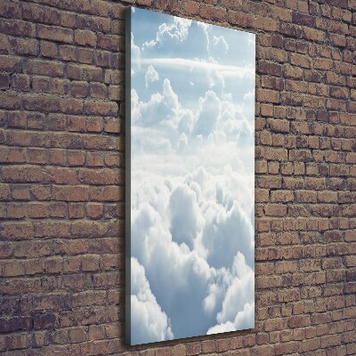 Verticale foto op canvas Vliegen boven de wolken