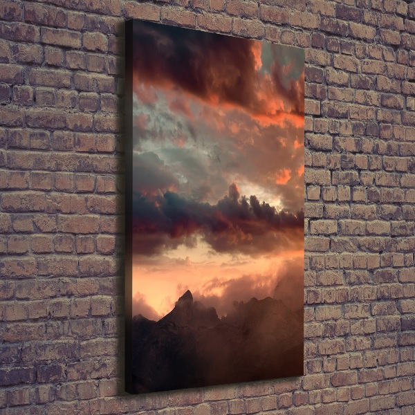 Verticaal schilderij op canvas Zonsondergang boven de bergen
