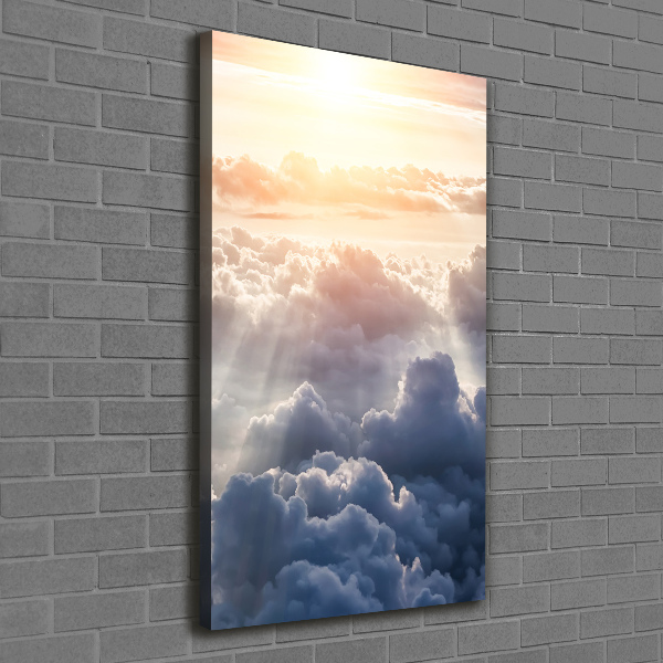 Verticale foto op canvas Vliegen boven de wolken