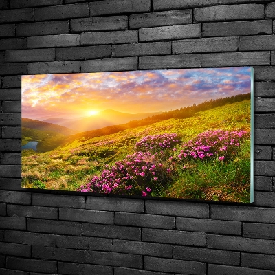 Schilderij glas Zonsondergang boven de bergen