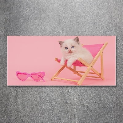 Foto schilderij op glas Kat op een ligstoel