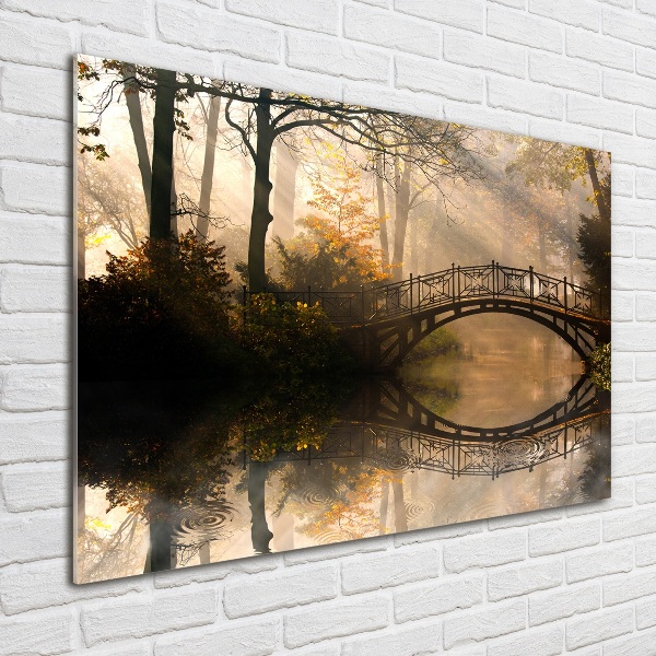 Schilderij op glas Oude brug in de herfst