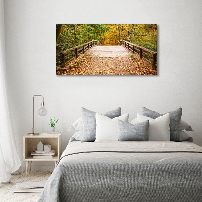 Foto schilderij op glas Brug in het herfstbos