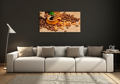 Foto schilderij op glas Koffiebonen en een kopje