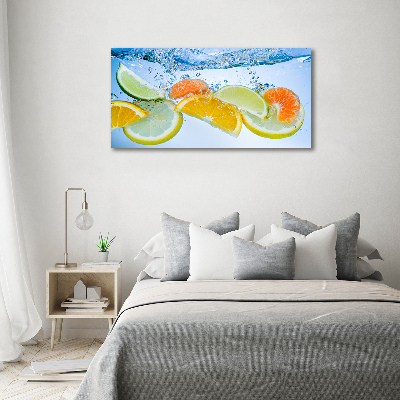 Schilderij op glas Citrusvruchten onder water