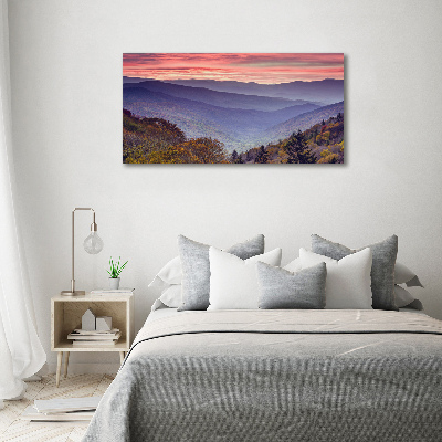 Schilderij op glas Zonsondergang boven de bergen