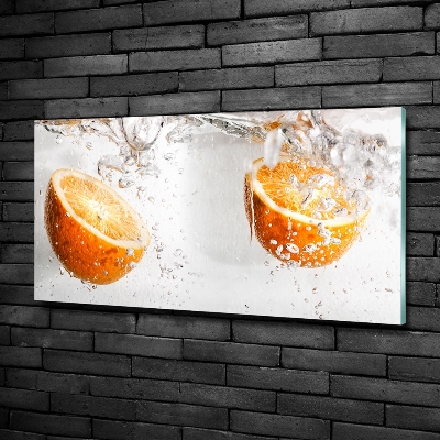 Foto schilderij op glas Sinaasappels onder water