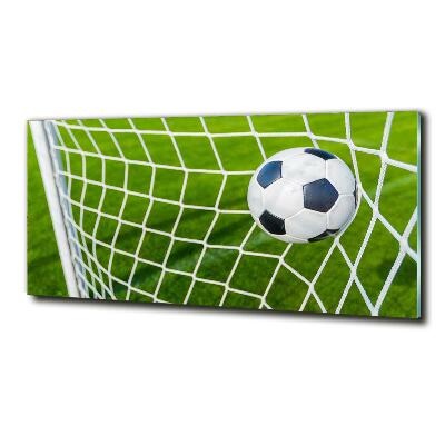 Schilderij glas De bal ligt in het doel.