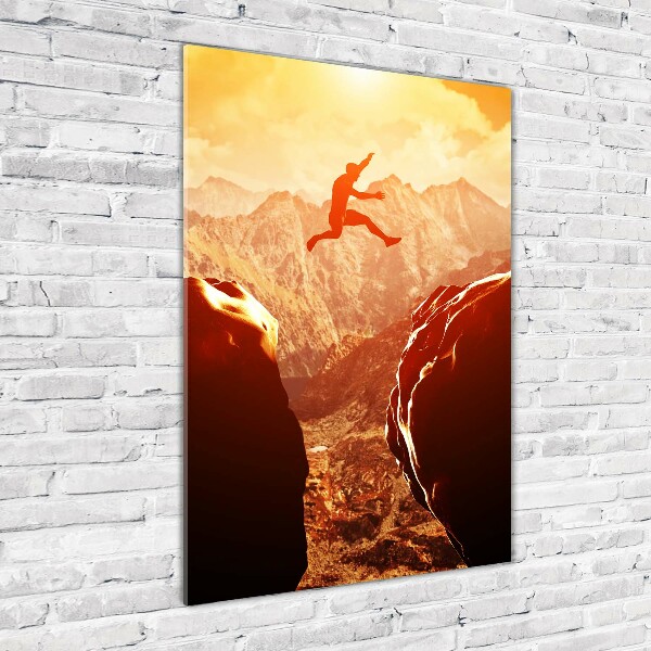 Verticale glasfoto Spring over de afgrond