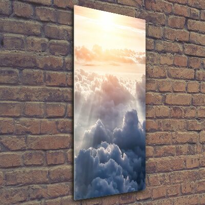 Verticale foto op glas Vliegen boven de wolken